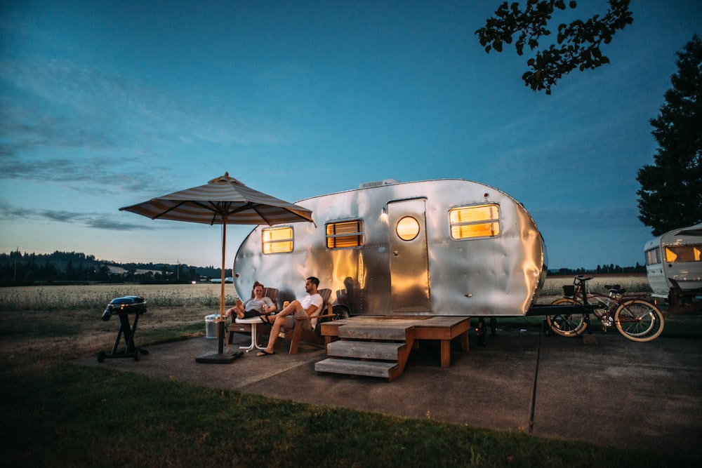 RV exterior at a campsite during a pre-purchase inspection visit